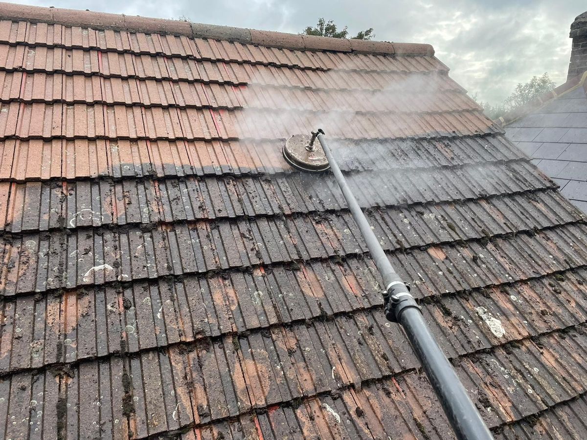 Roof steam cleaning, moss and grime lifted off the tiles